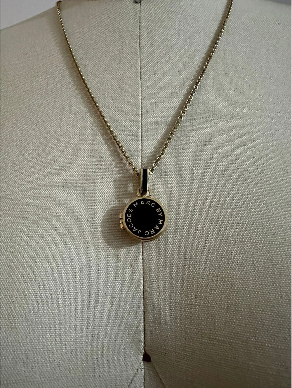 MARC BY MARC JACOBS Gold and Black Round Pendant Locket